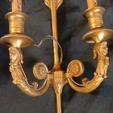 Paire d'appliques en bronze doré style empire.