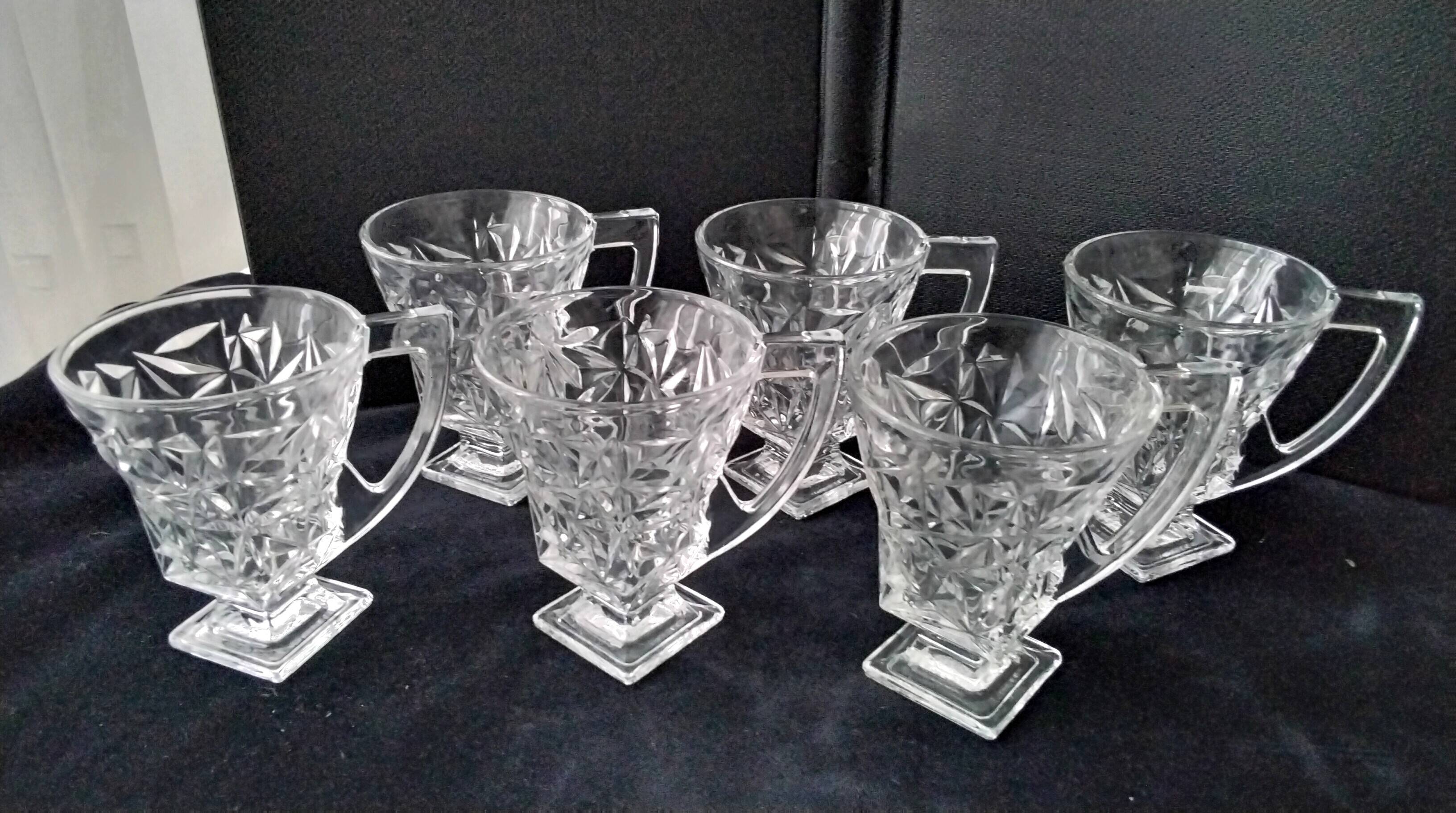 6 tea glasses with handles made of pressed moulded glass