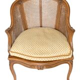 Louis XV style caned bergère armchair