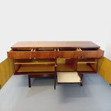 Vintage Scandinavian style row in rosewood and brass from the 60s