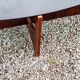Designer coffee table by Hugues Poignant in rosewood and smoked glass from the 70s