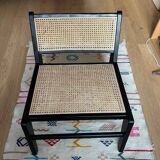 Teak and cane armchair