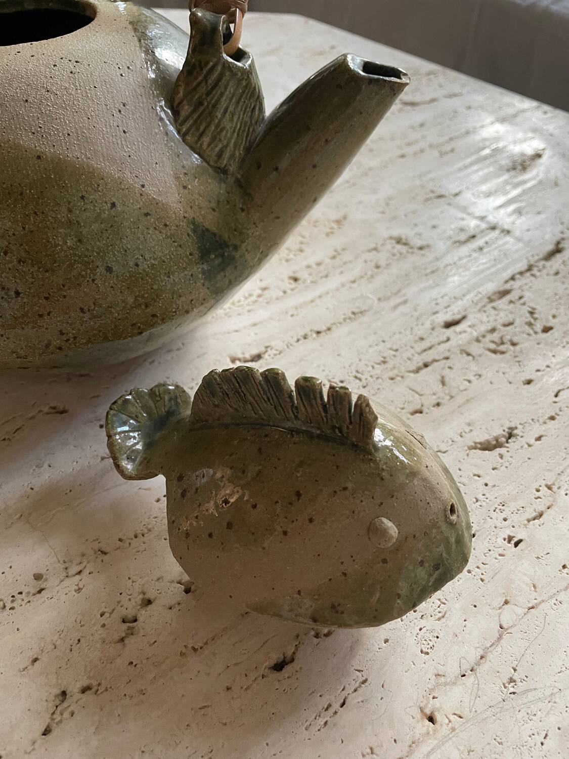 Handmade ceramic teapot with green fish and bamboo