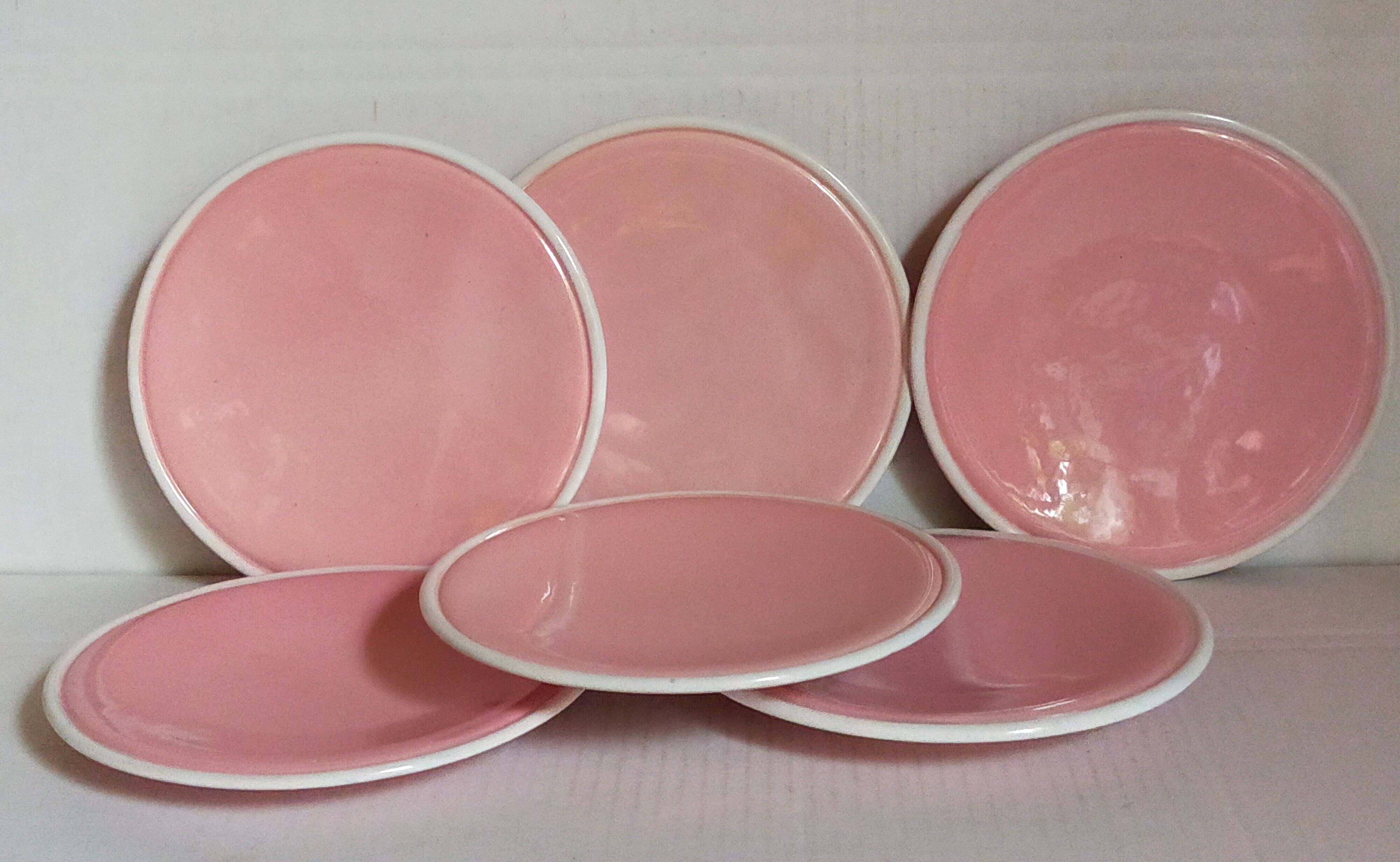 Six old pink earthenware dessert plates