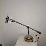 Articulated chromed metal lamp