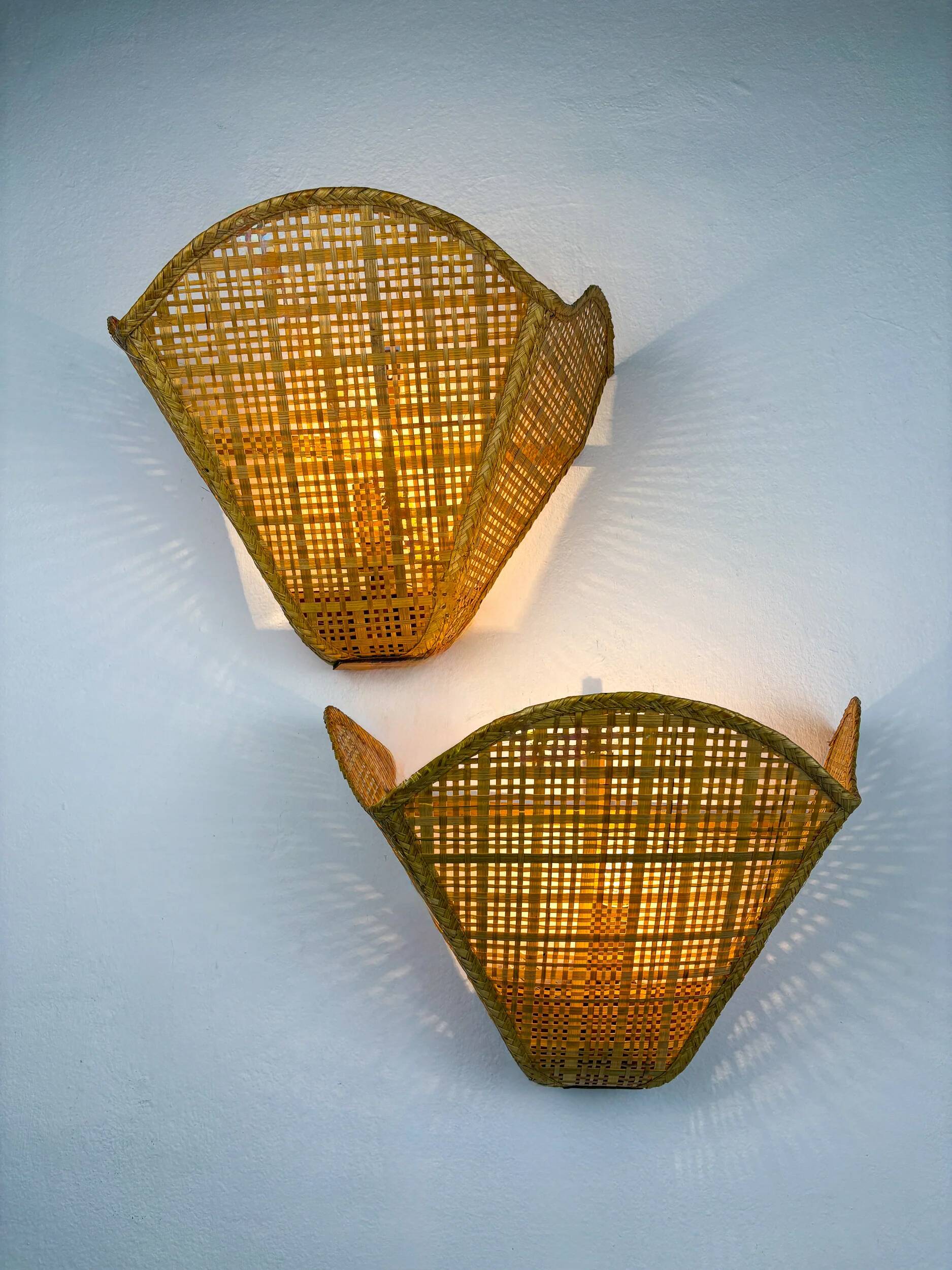 Pair of scalloped rattan wall sconces, sourced in Spain, 1980s