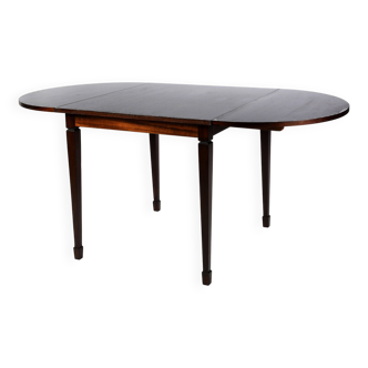 Small mahogany dining table with extensions