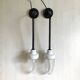 Pair of Art Deco wall lights in cast iron, glass and ceramic from the 1930s.