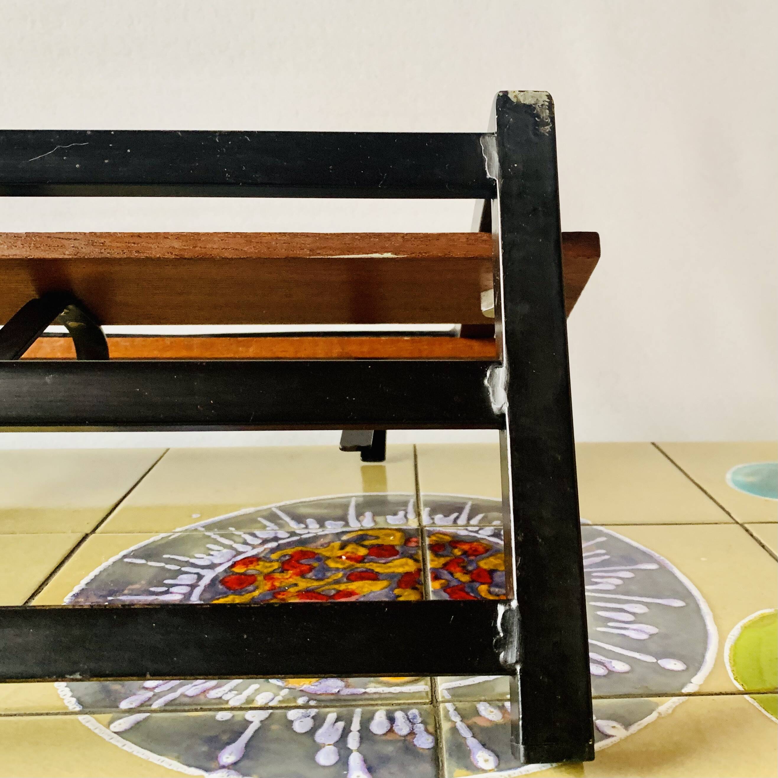 Vintage wall-mounted coat rack in wood and black metal