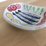 Cup in ceramic, fish and raw vegetables