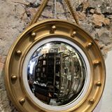 Witch mirror porthole style in gilded wood, diameter 44 cm.