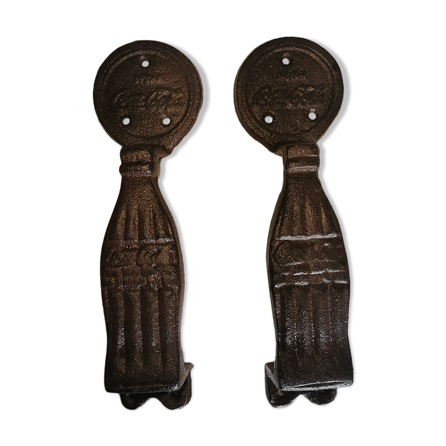 Cast-and-white coca cola door handles