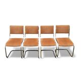 Set of 4 vintage sled chairs from the 1970s