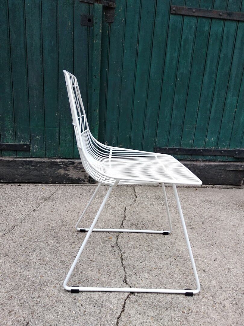 Very nice white chair metal design.