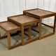 Set of 3 nesting tables in teak with tiled tops.
