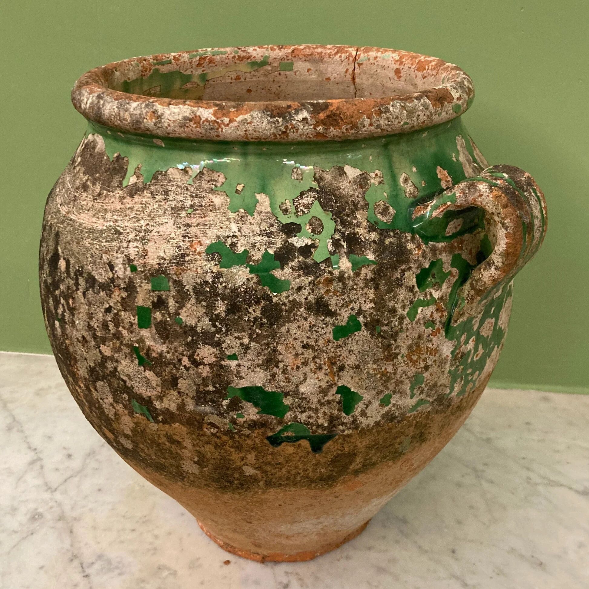 19th-century confit pot. Glazed green terracotta.