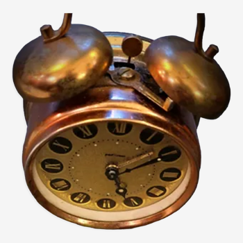 Mechanical alarm clock bell in vintage copper