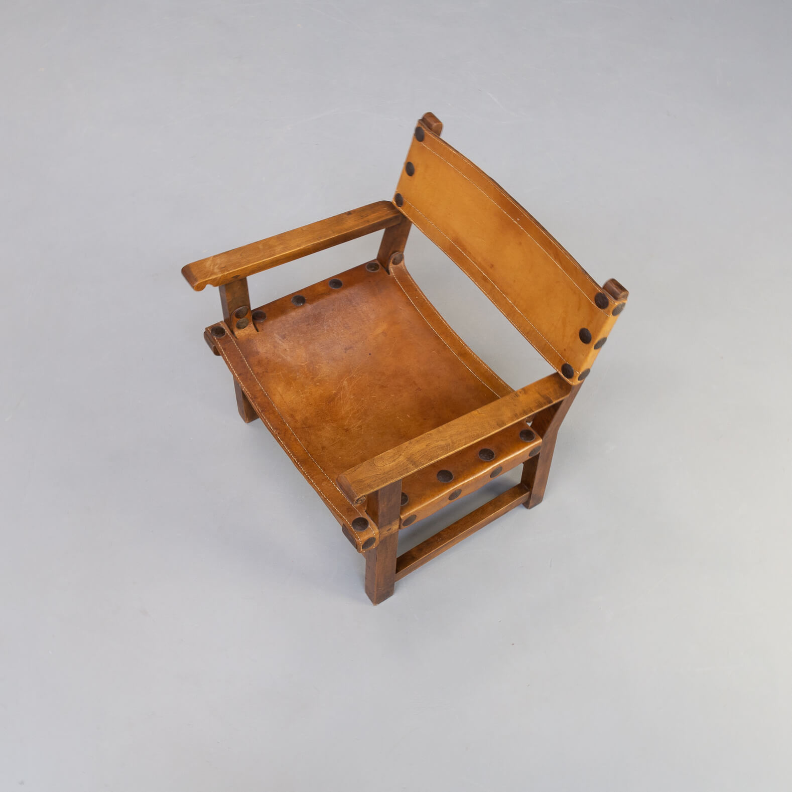 50s oak brutalist spanish chair with saddle leather