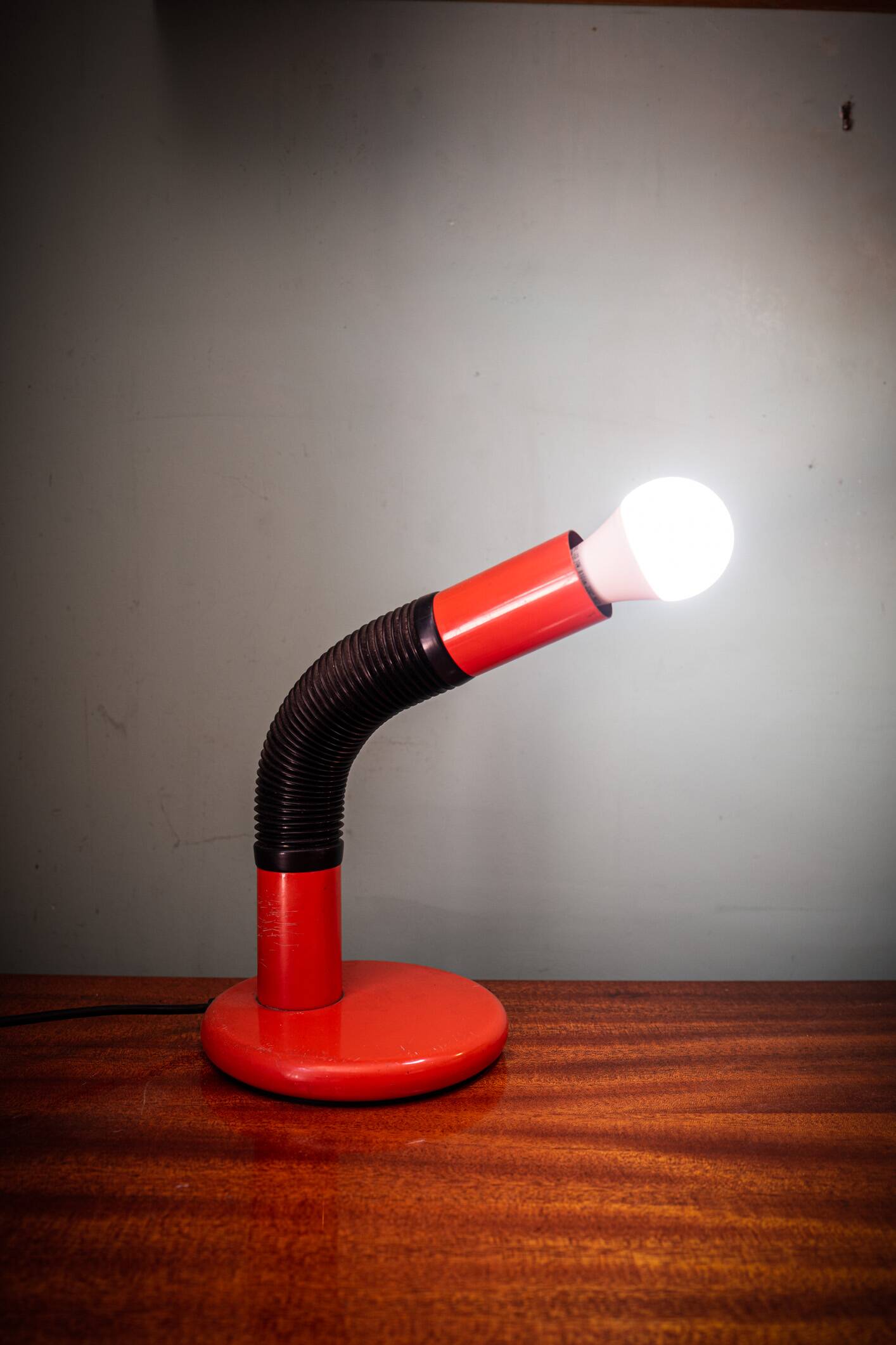 Orange Elbow table lamp by E. Bellini for Targetti Sankey, Italy, 70's