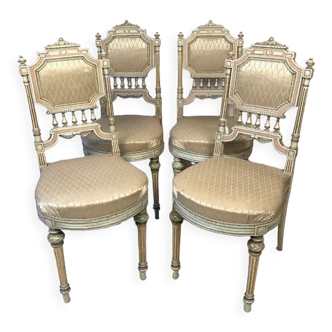Set of four Louis XVI style chairs in lacquered wood, late 19th century