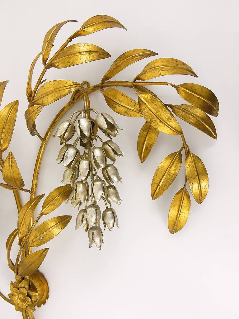 Large gold metal wall lamp in Hollywood Regency style by Hans Kögl, Maison Jansen.