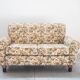 2-seater sofa, floral fabric, wooden structure, plastic and wooden legs, 1970