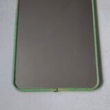 Old barber mirror of mint green color