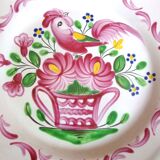 Assiette plate à décor St-Clément corbeille fleurie et oiseau