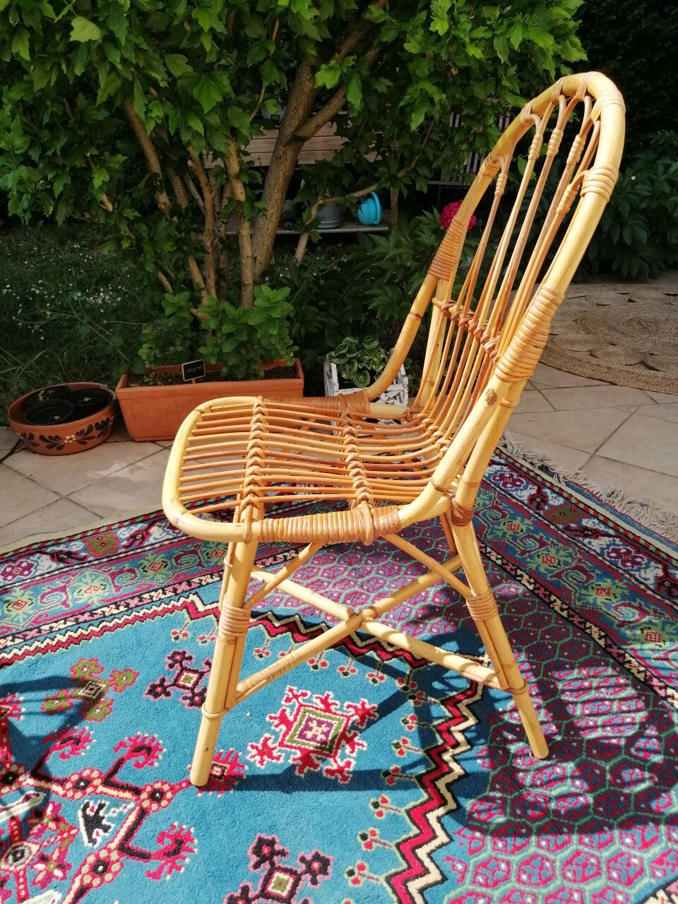 Series of 4 vintage rattan chairs.