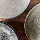 Handmade round ceramic bowls made of Japanese stoneware.