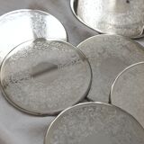 6 vintage chiseled silver metal coasters