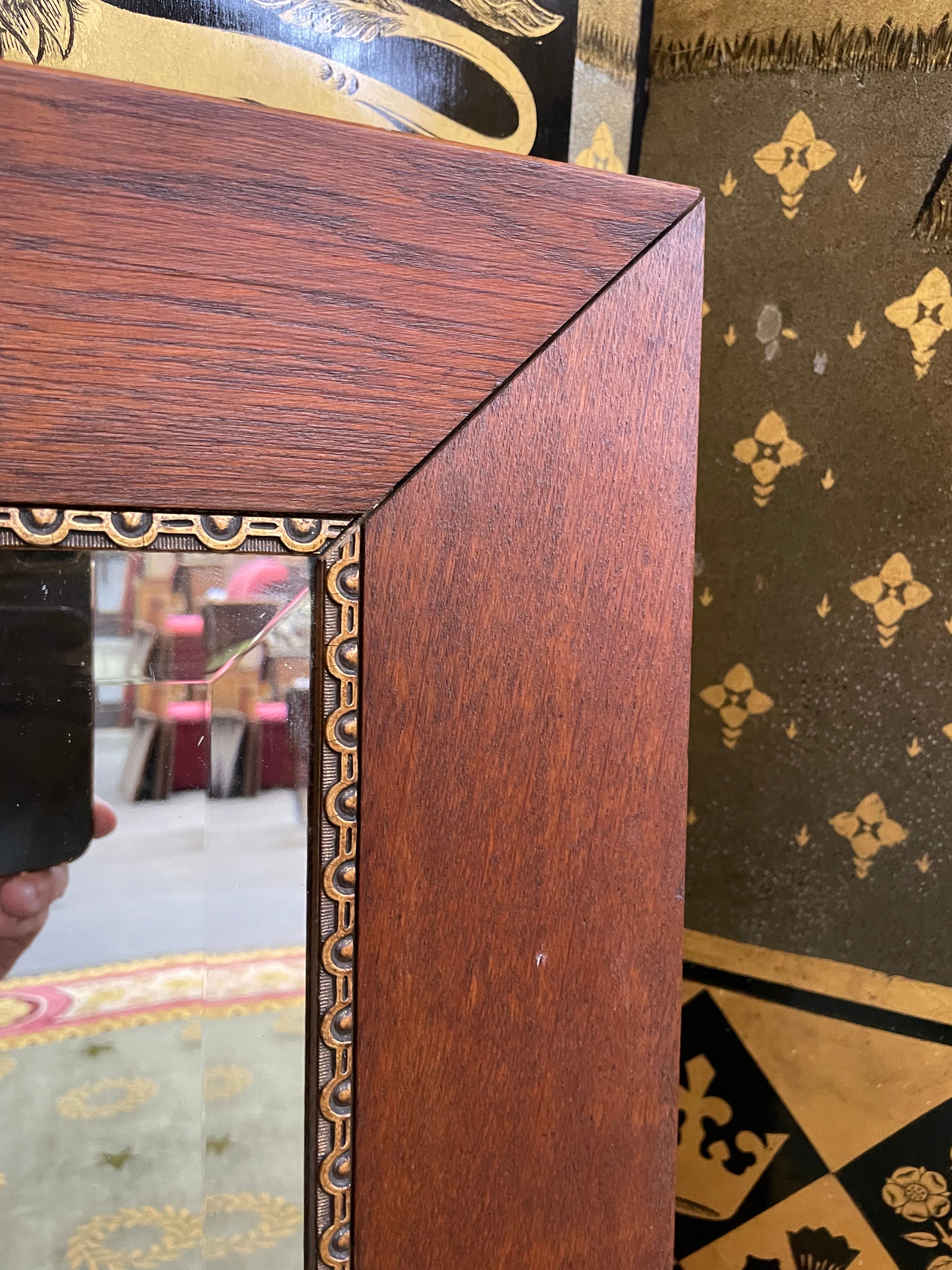 Oak mirror and old golden border