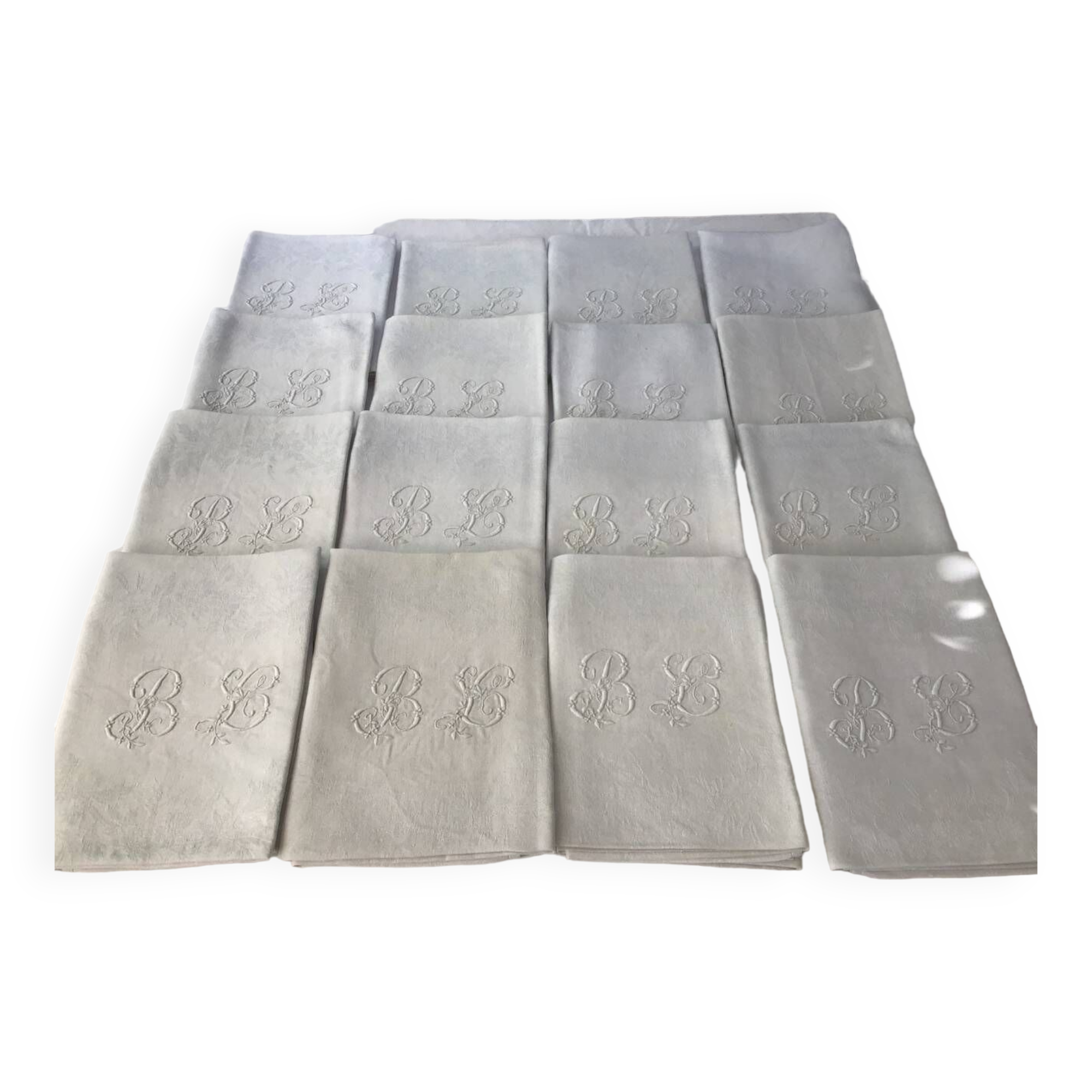 Set of 12 19th century white napkins marked “BL”
