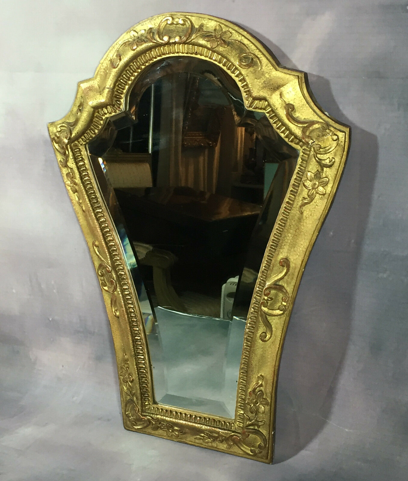 Wooden bevelled mirror and gilded stucco 49 x 35.5 cm