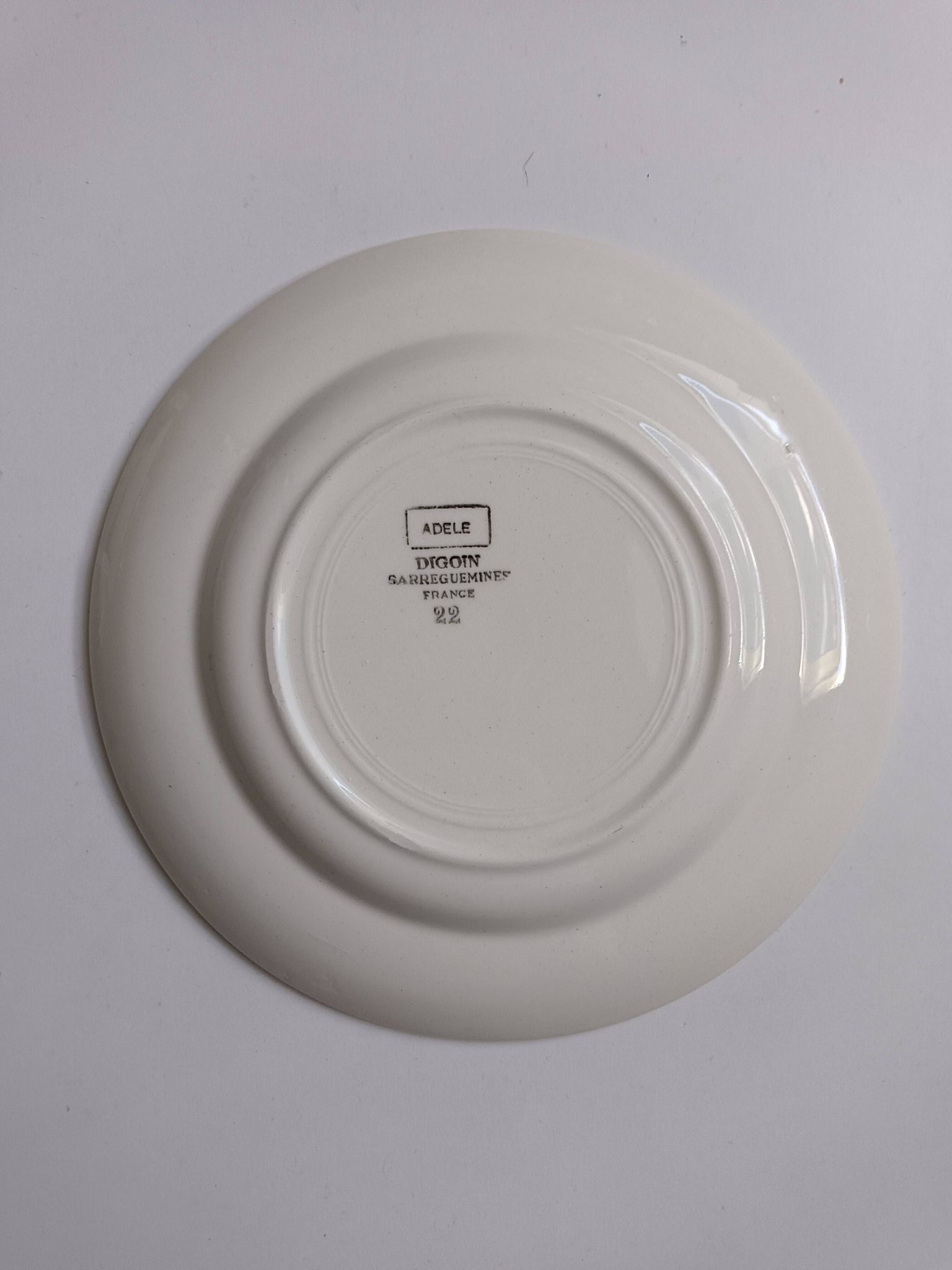 3 Digoin Sarreguemines Adèle plates in grey, yellow, and burgundy.