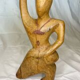 Wooden woman sculpture