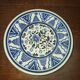 Henriot Quimper earthenware coffee set with floral decoration and elegant blue