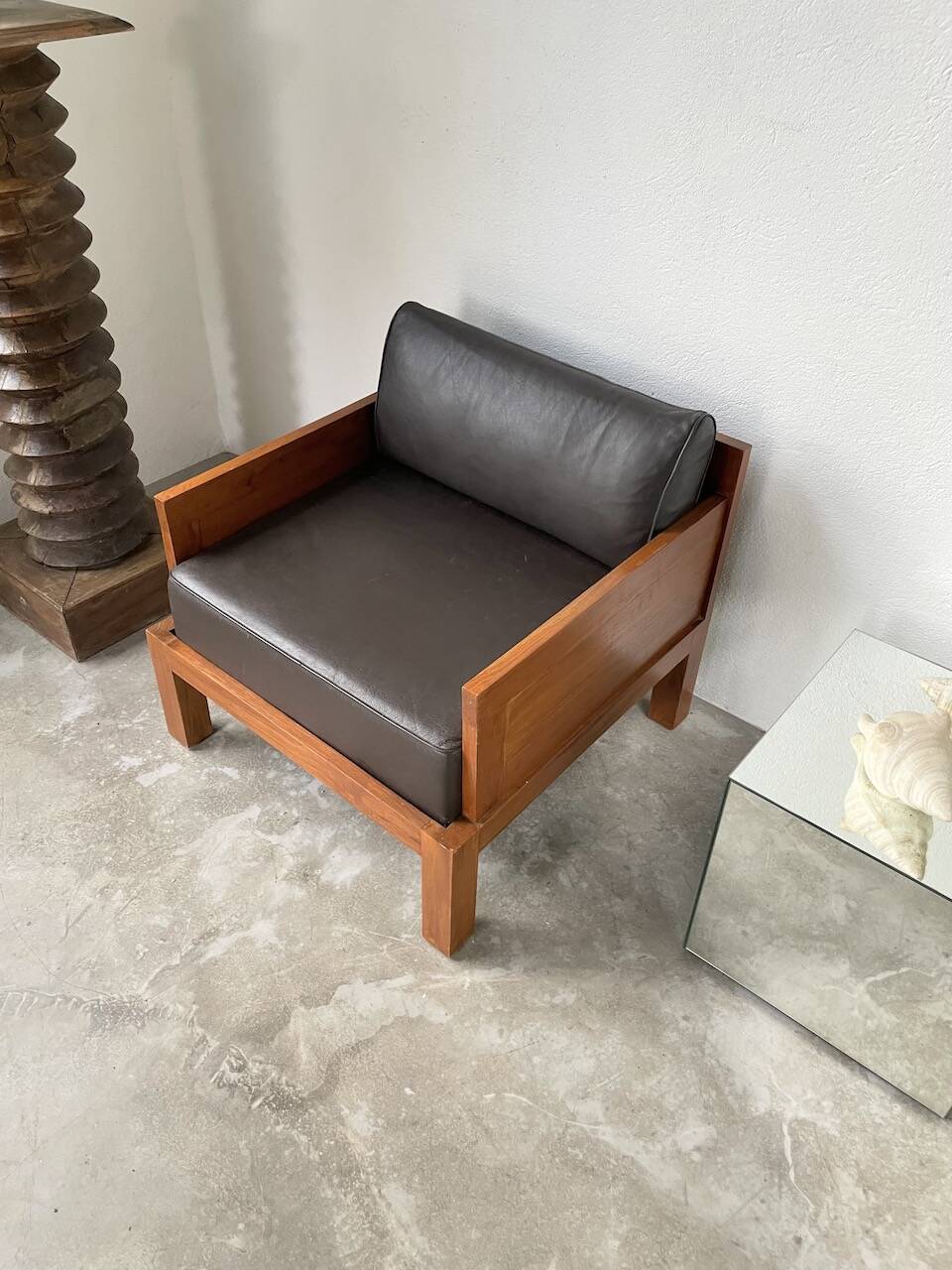 Modernist armchair in exotic wood and leather