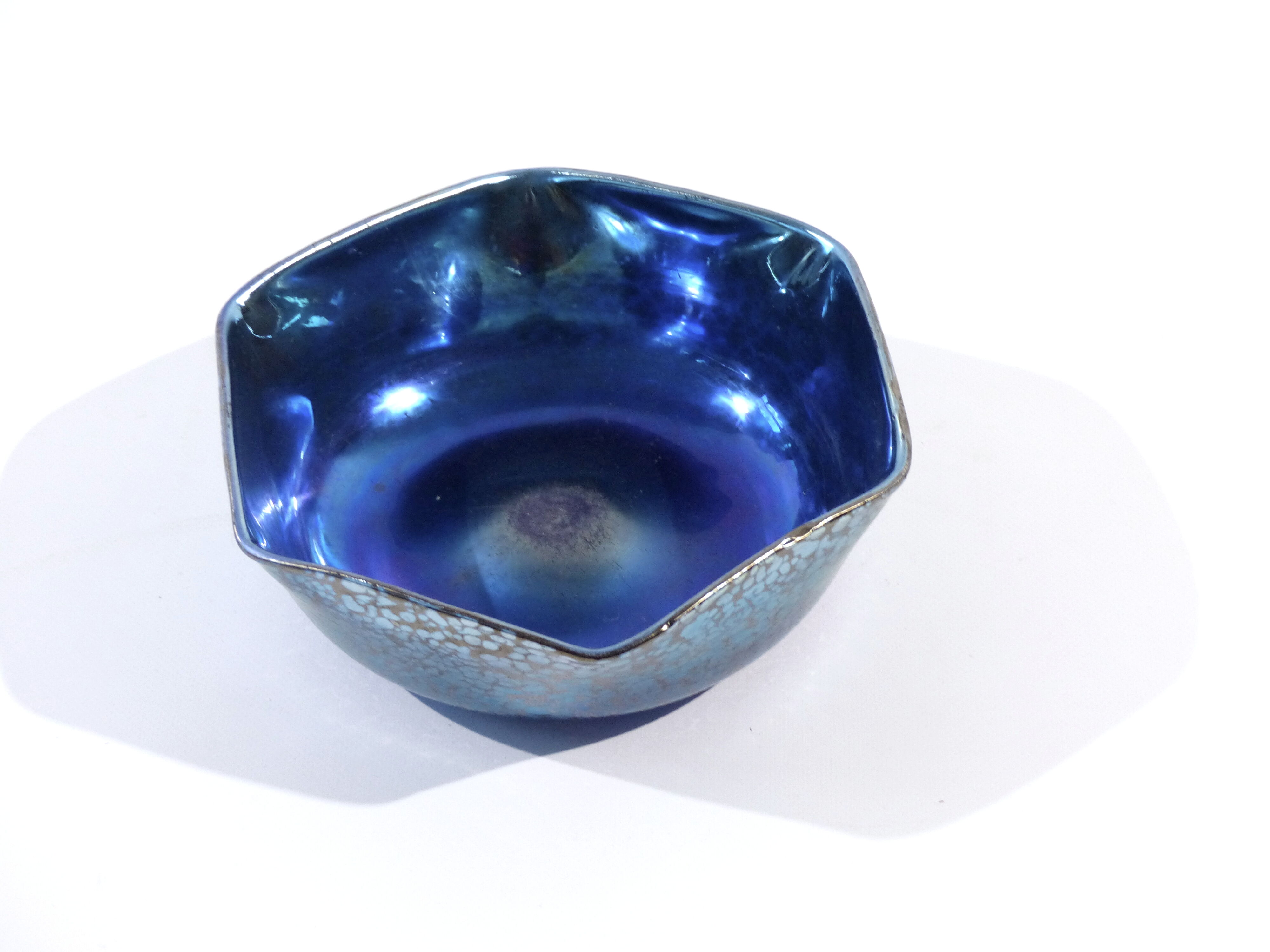 Iridescent dish of malta