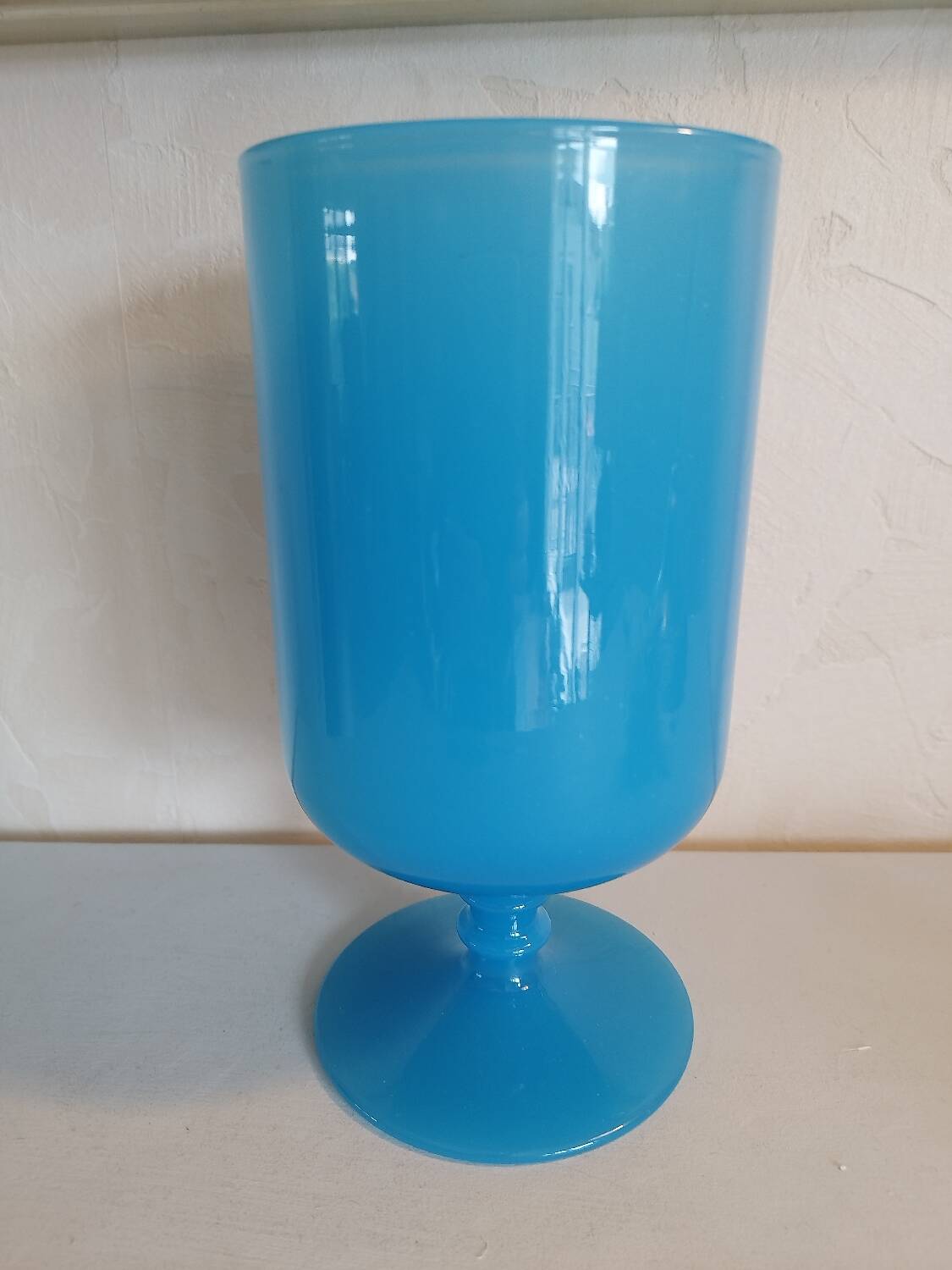 Blue vase on opaline pedestal