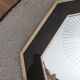 Octagonal mirror 70s in magnifying glass and brass