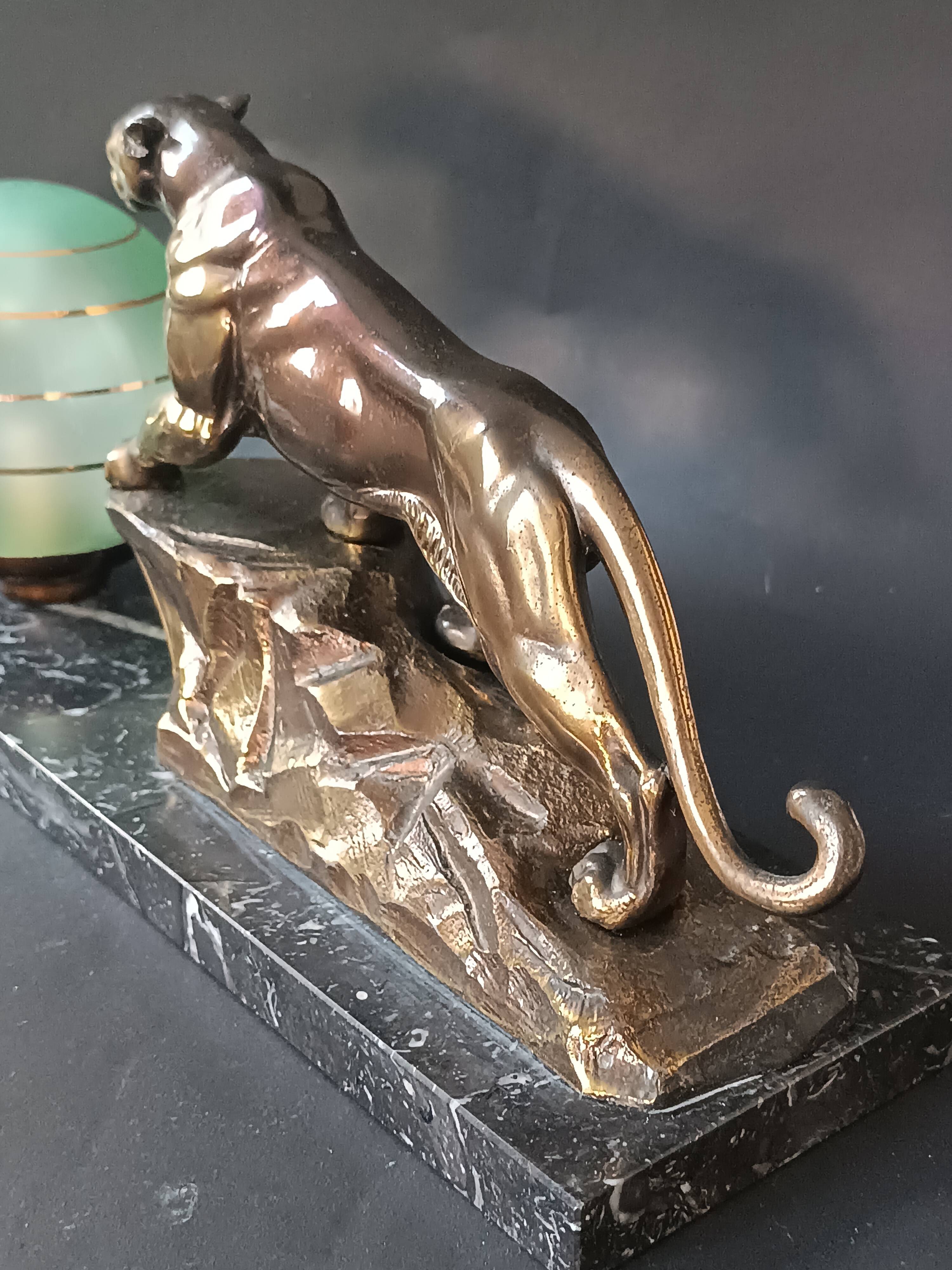Panther desk lamp in spelter on a black and white marble base 1925