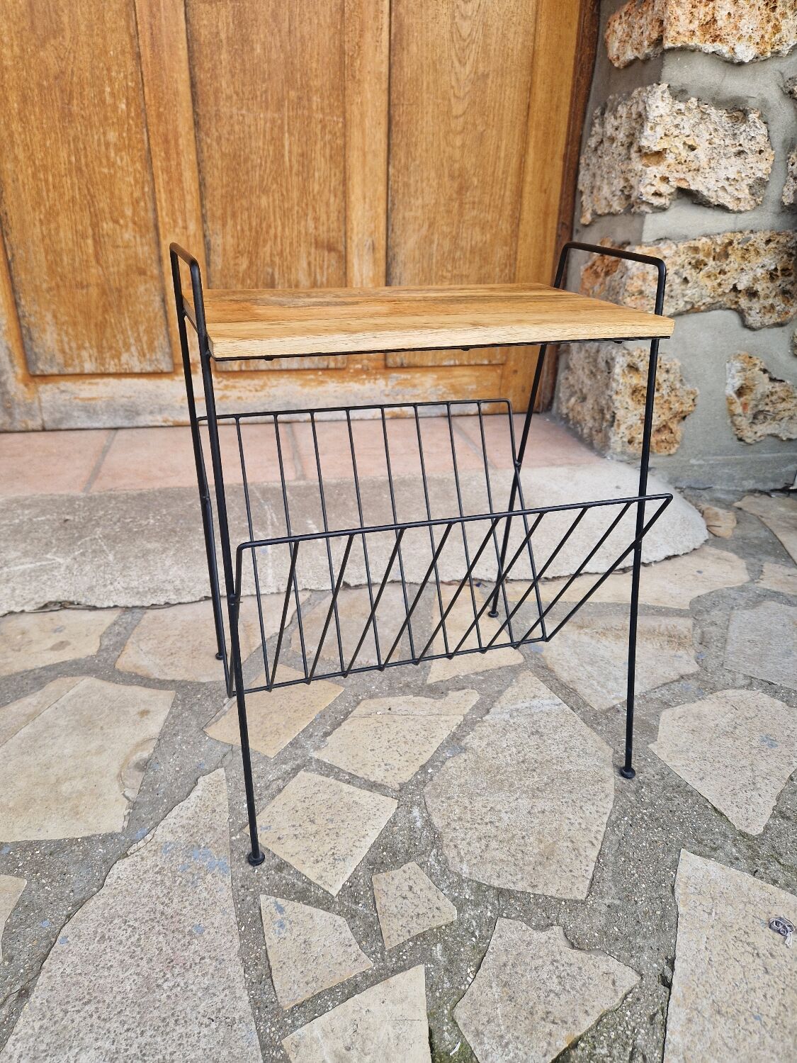 Bedside table with magazine holder