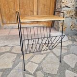 Bedside table with magazine holder