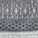 Vintage hand knotted rug with geometric patterns on a grey/beige/terracotta background 170 x 96 cm