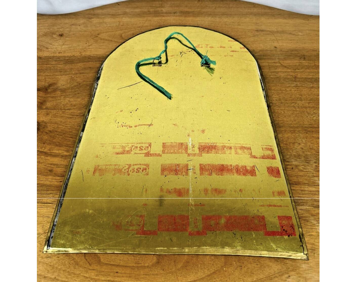 Vintage golden half-moon mirror