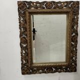 Napoleon III style mirror in carved wood, 20th century.