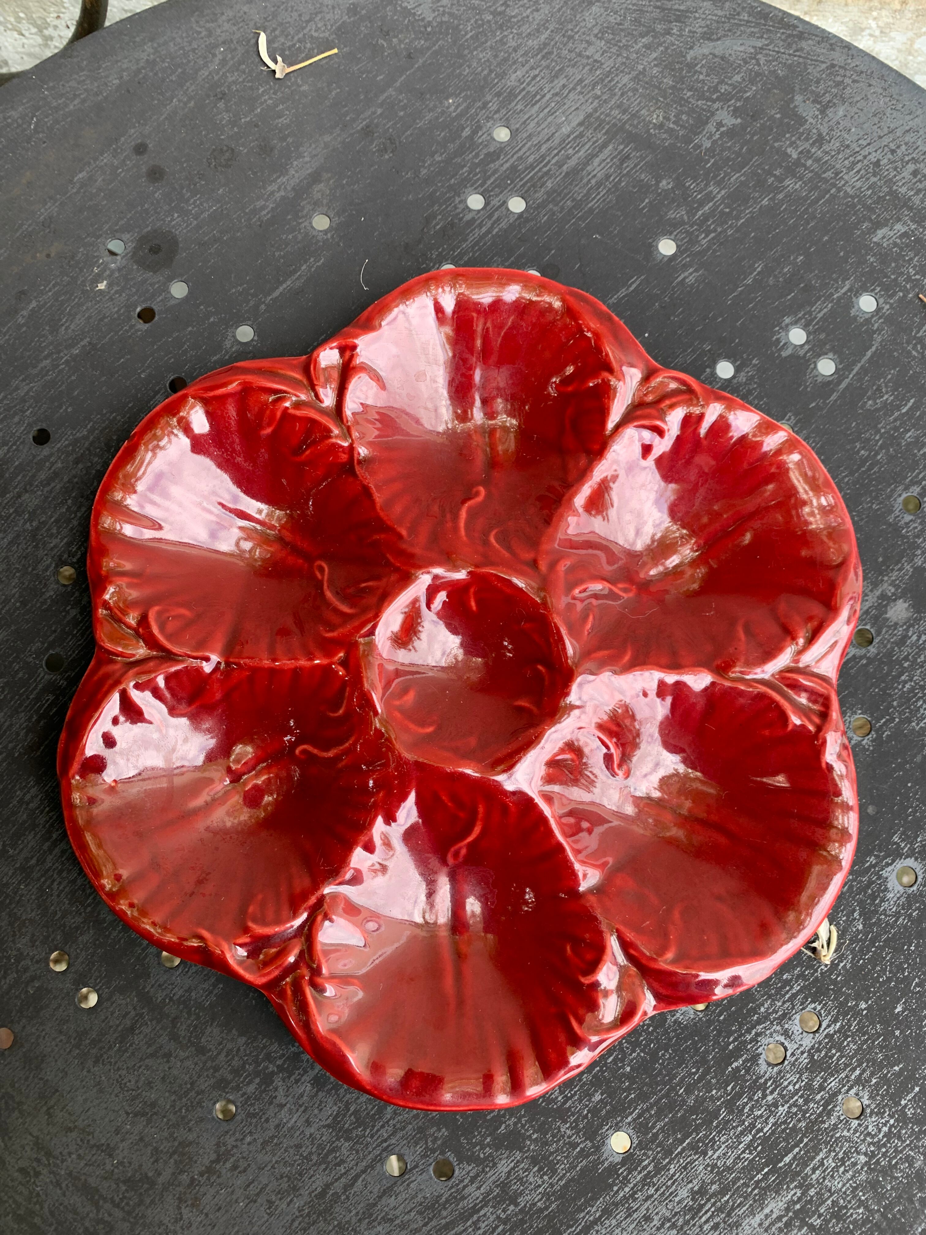 4 oyster plates in vintage red glazed ceramic slip and collector