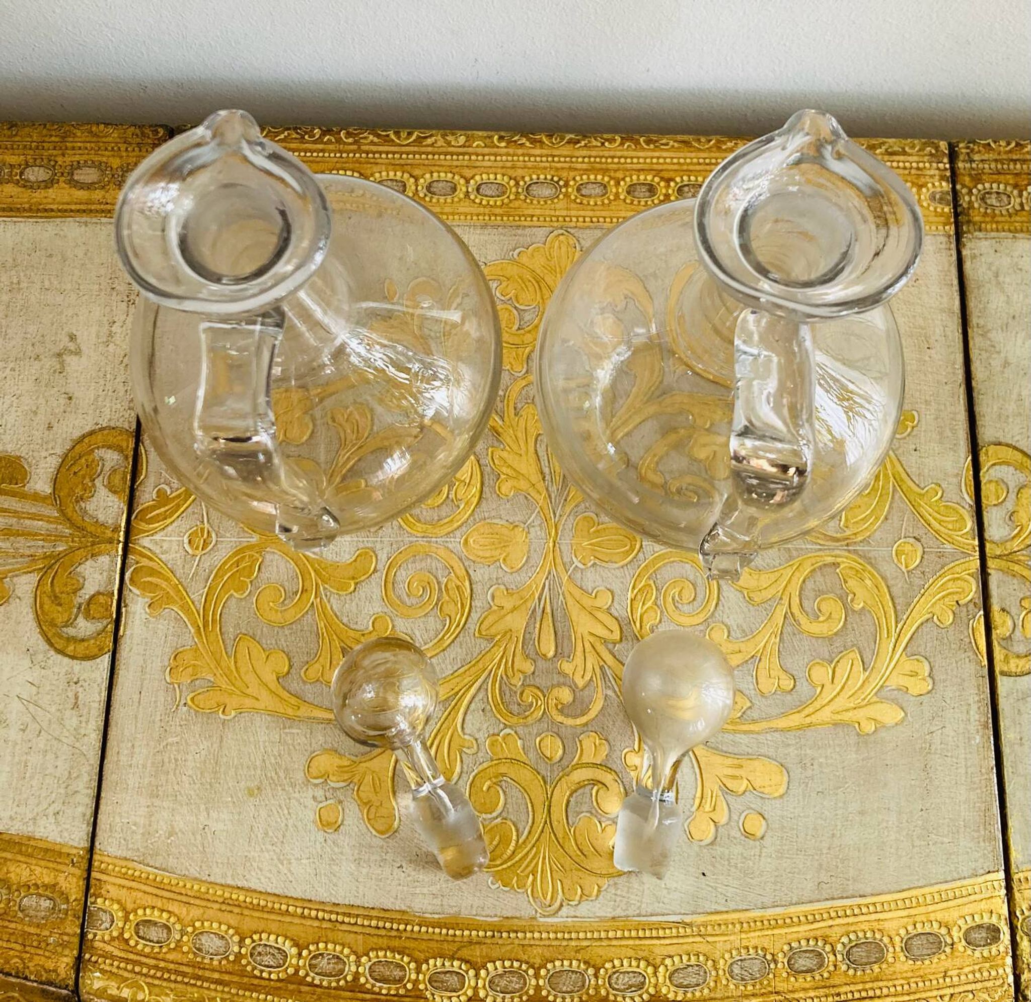 Wine pitchers or carafes in glass from the 19th century.