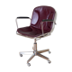 Dark red leather hairdresser's chair